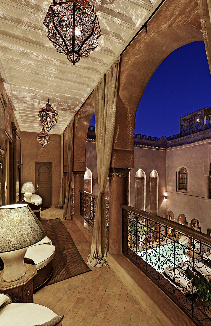 Balcony overlooking courtyard and pool, Riad Noir D'Ivoire, Marrakech, Morocco