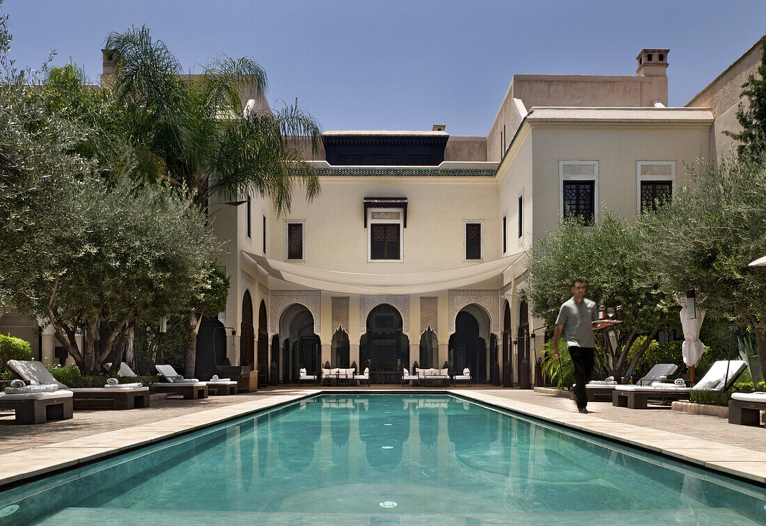 Loungers around the pool, Villa des Orangers, Marrakech, Morocco