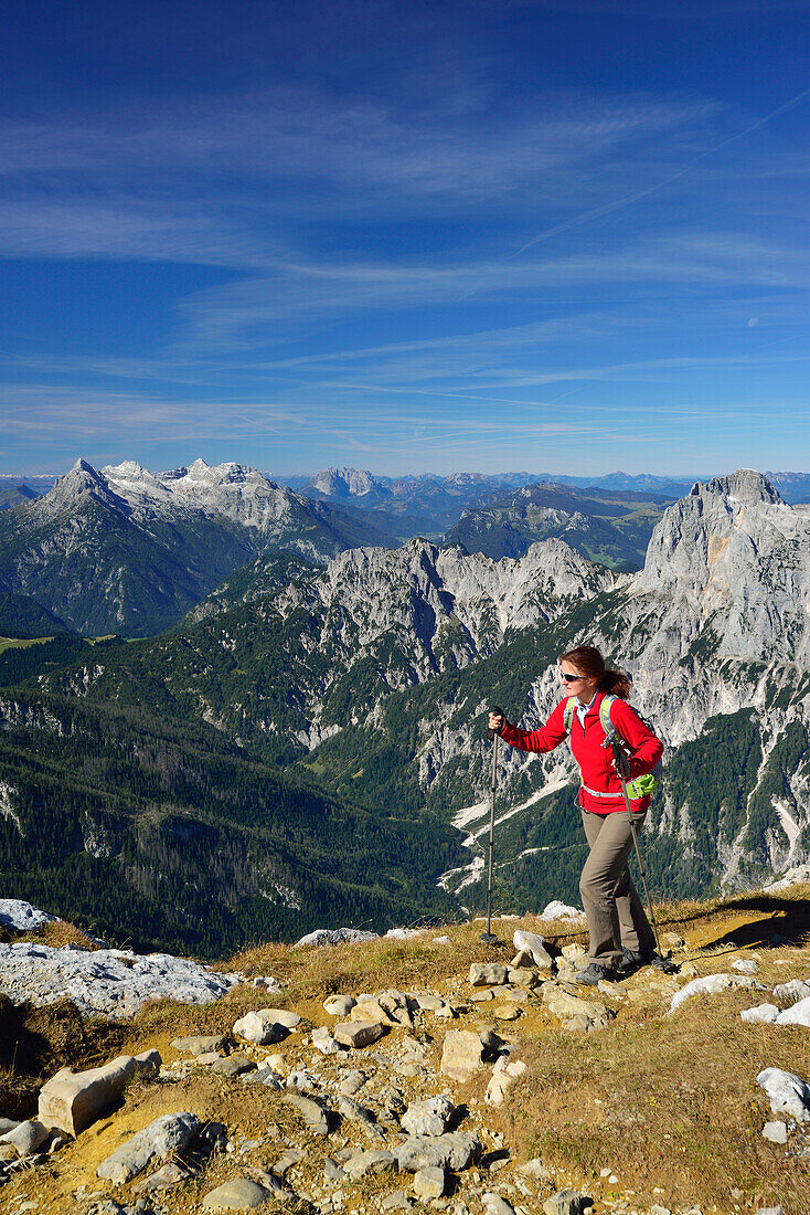 Woman ascending to Hochkalter, Berchtesgaden National Park, Berchtesgaden Alps, Upper Bavaria, Bavaria, Germany