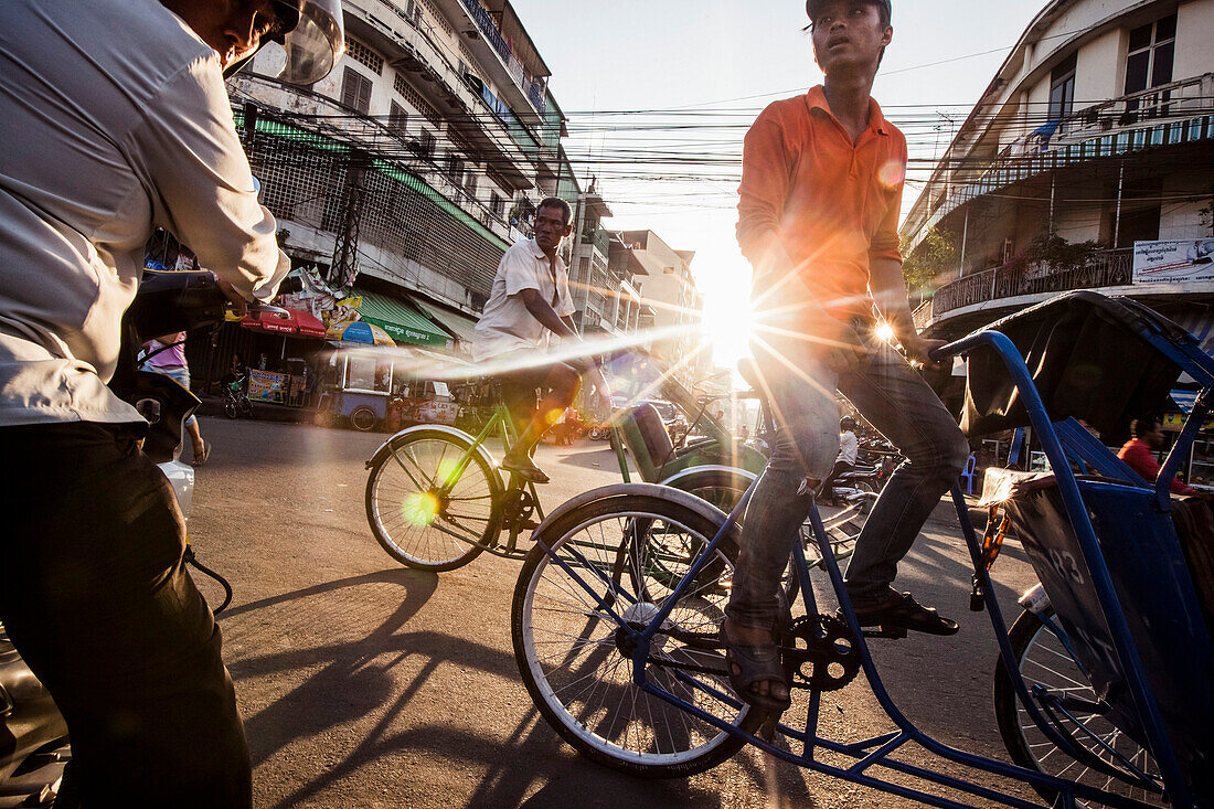 Cyclo Drivers on Busy Street, Phnom Penh, Cambodia