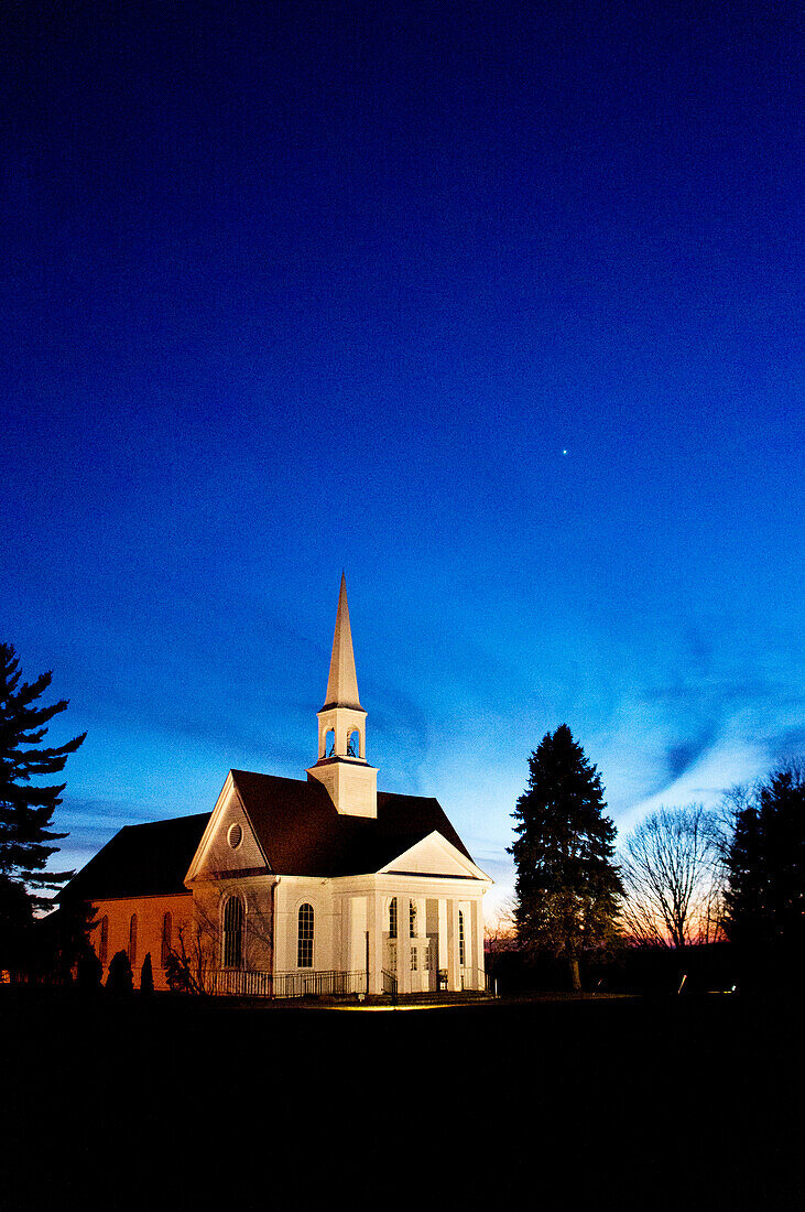 Illuminated Church at Sunset