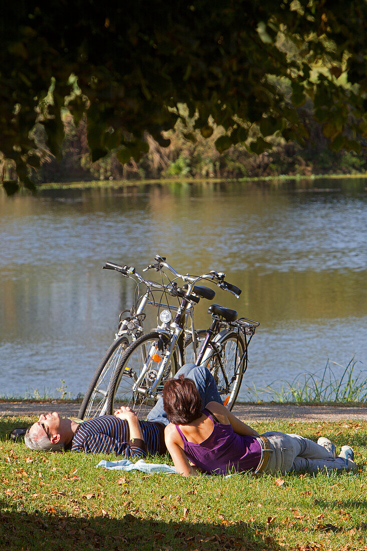 Couple Of Cyclists Relaxing Along The 'Loire A Velo' Cycling Itinerary, Savonnieres, Indre-Et-Loire (37), France