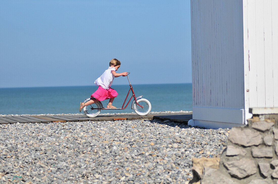 Little Girl On A Scooter On The Boardwalk, Beach Of Cayeux-Sur-Mer, Bay Of Somme (80), France