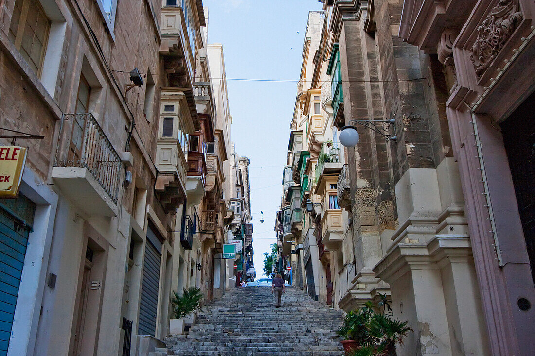 Street Scene Featuring Stairs And Buildings With Enclosed Balconies, Valletta, Malta