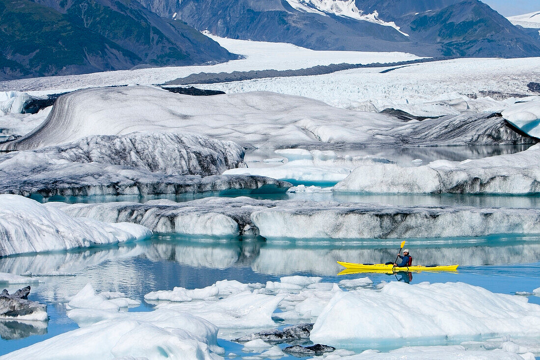 Female Kayaker Paddles Yellow Kayak In Bear Cove Lagoon Resurrection Bay Alaska Kenai Fjords Np Kenai Peninsula Summer