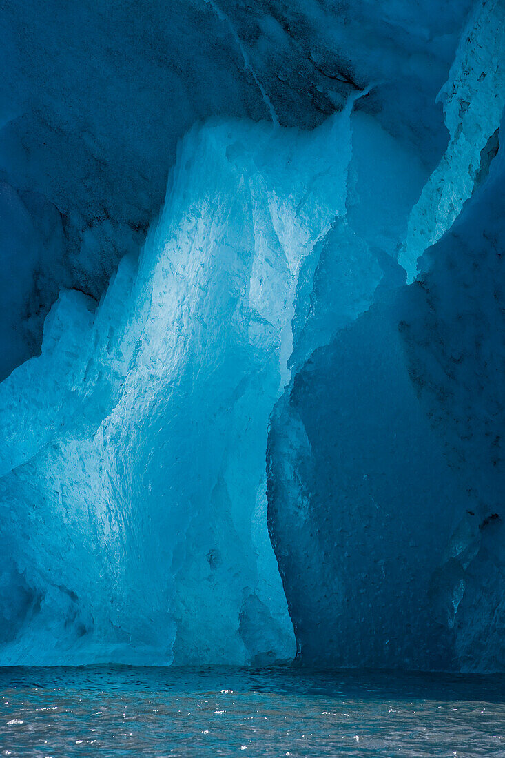 Late Afternon Light Shines Through The Face Or Terminus Of Mendenhall Glacier As Seen From Mendenhall Lake In Tongass National Forest Near Juneau, Southeast Alaska, Spring