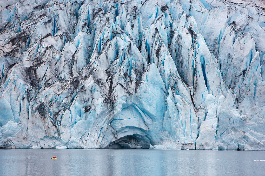 Man Kayaking In Shoup Bay With Shoup Glacier In The Background, Shoup Bay State Marine Park, Prince William Sound, Southcentral Alaska