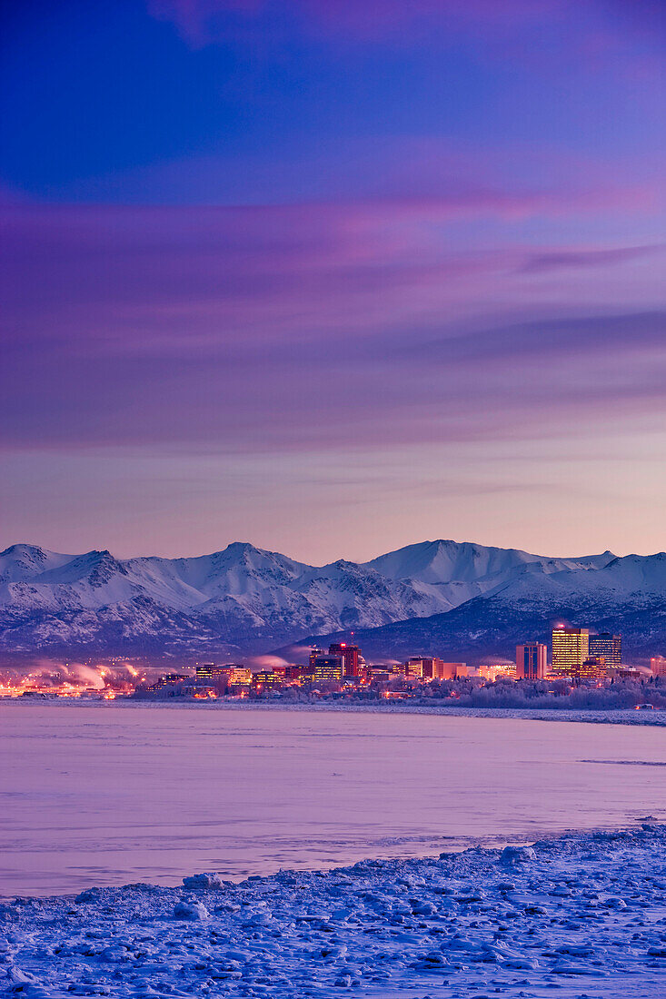 Panorama View Of The Anchorage Skyline Just Before Dawn As Seen From Earthquake Park During Winter, Southcentral Alaska