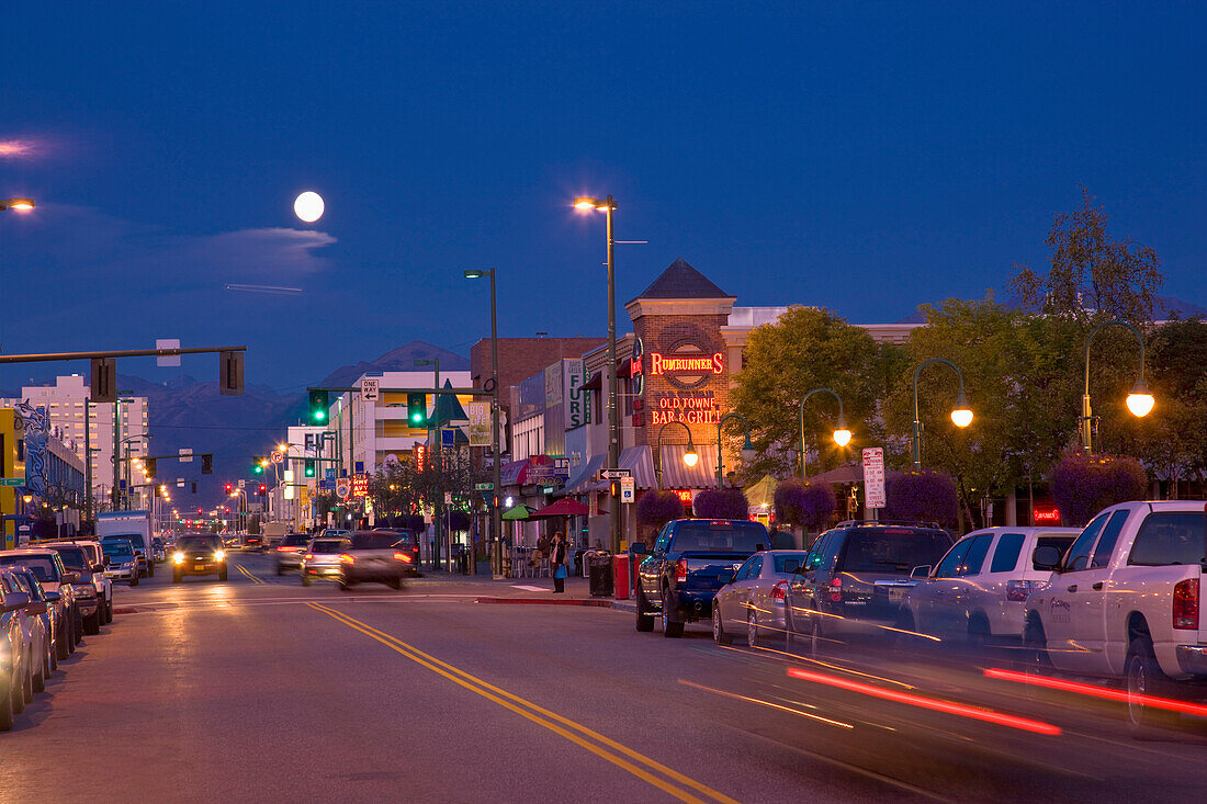 Full Moon Rising Over Downtown Anchorage And 4Th Avenue, Southcentral Alaska