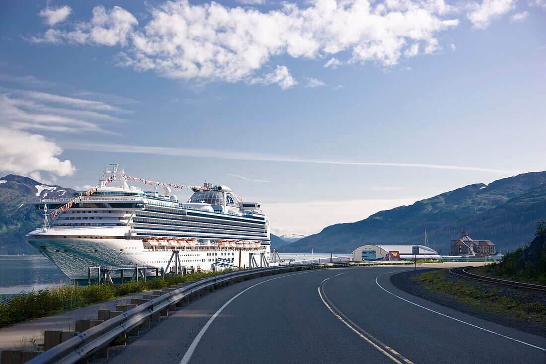 View Of The Road To The Whittier Harbor And The *Diamond* Princess Cruise Ship Docked During Summer, Southcentral Alaska