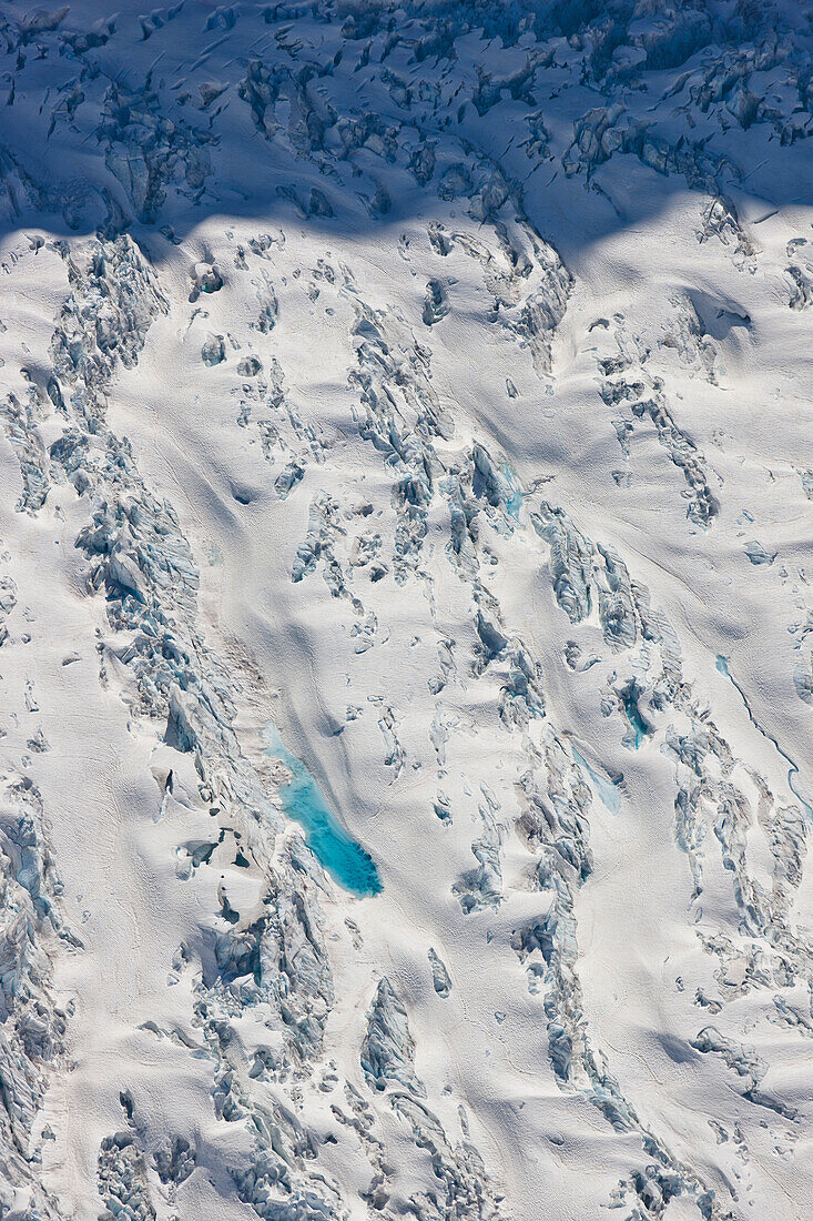 Aerial View Of A Glacier Moraine And Melt Water Pond, Coastal Mountain Range North Of Haines, Southeast Alaska, Summer