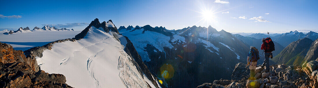 Two Hikers View The Gilkey River Valley And Juneau Ice Field, Tongass National Forest, Southeast Alaska, Summer