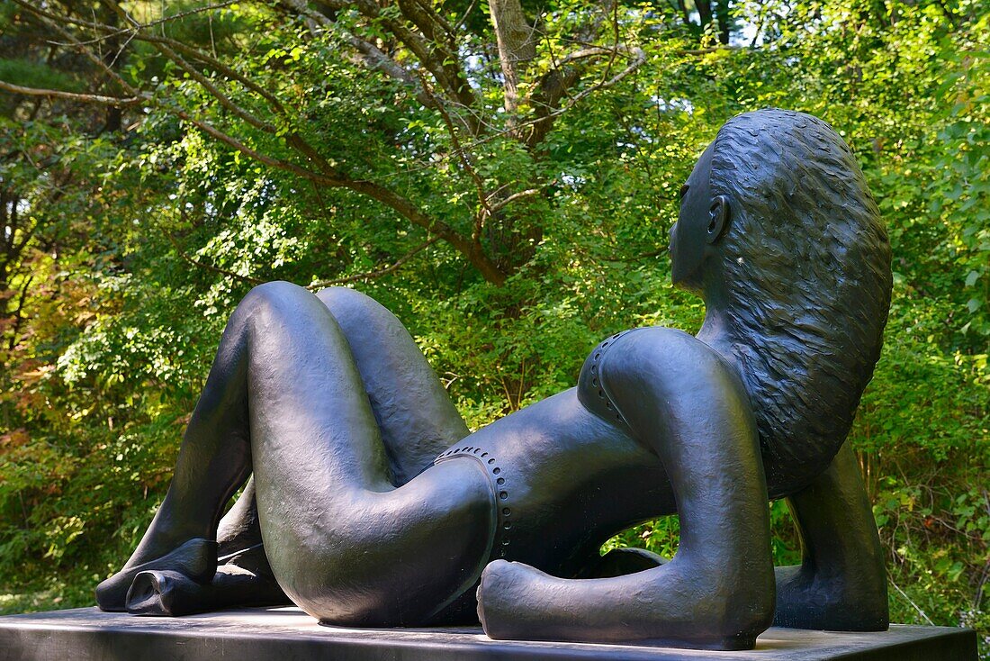 Bronze sculpture of sunbather at McMichael sculpture garden Kleinberg