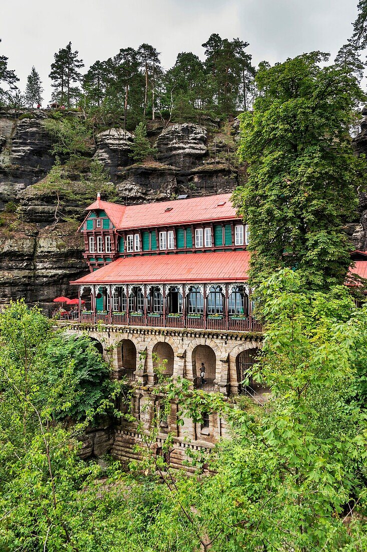 Popular restaurant destination Falcon´s nest at Pravcicka brana The Pravcicka brana German: Prebischtor is located in the Elbe Sandstone Mountains in the Bohemian Switzerland The narrow rock formation is the largest natural sandstone arch in Europe, Czech