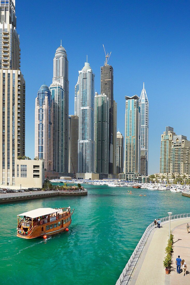 Dubai Marina, small tourist boat on the canal, Dubai, United Arab Emirates