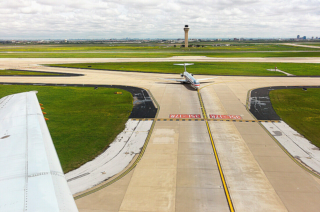 Airplanes taxing on the runway