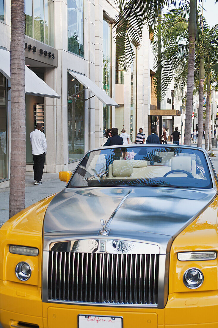 Paul, Quayle, Outdoors, Day, Front View, Incidental People, Building Exterior, Architecture, Street, Transportation, Car, Palm Tree, Wealth, Luxury, California, USA, Yellow, Lighting Equipment, Shiny, Vibrant Color, Limousine, Convertible, City Life, Open