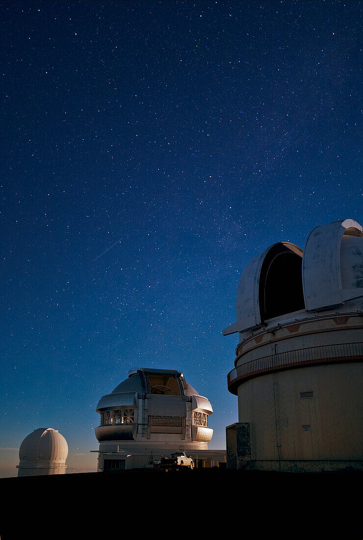 Hawaii, Big Island, Mauna Kea summit, Canada and France Observatory and stars.