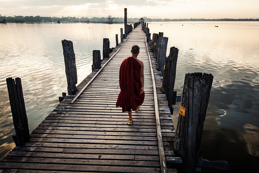 Young Monk Walking Across Wooden Bridge, Rear View, Amarapura, Myanmar