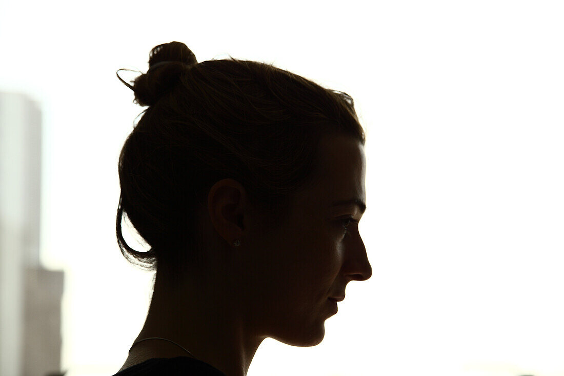 Silhouette of Serious Young Woman, Profile