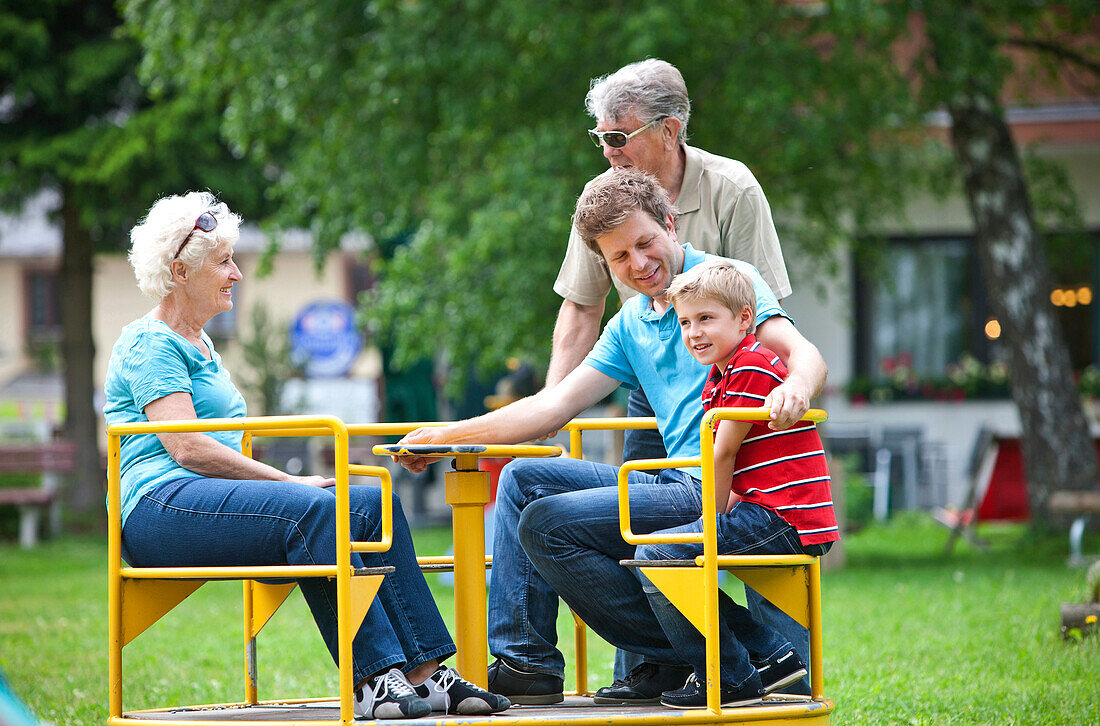 Family at playground, Styria, Austria