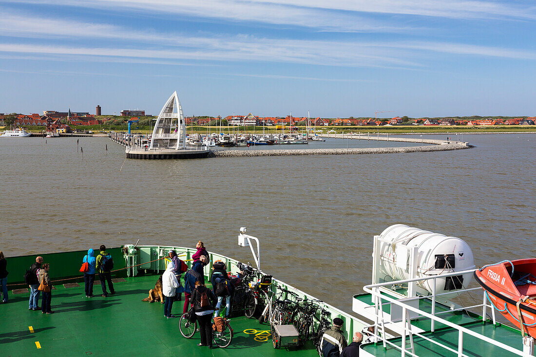 Ferry boat in Juist harbour, Observation Tower, landmark, Juist Island, Nationalpark, North Sea, East Frisian Islands, East Frisia, Lower Saxony, Germany, Europe