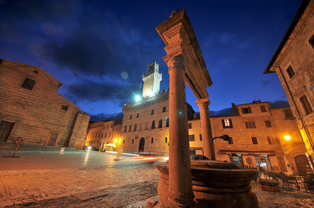 Fountain on town hall square at night, Montepulciano, South Tuscany, Tuscany, Italy