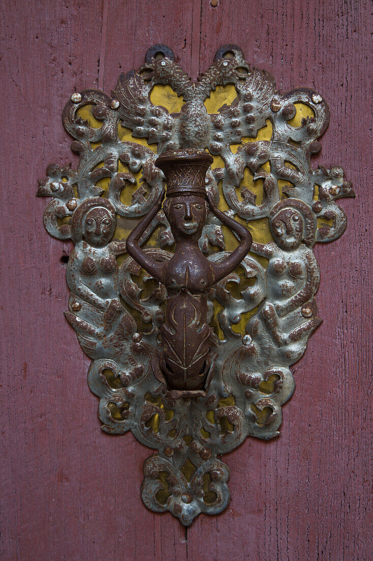 Door ornament on St. George's minster in Altstadt old town, Dinkelsbuehl, Franconia, Bavaria, Germany