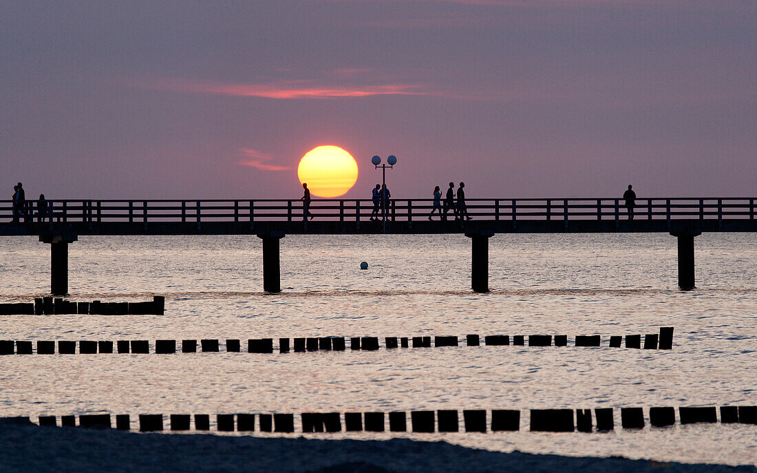 Pier at sunset, Seaside resort of Kuehlungsborn, Baltic Sea, Mecklenburg-Western Pomerania, Germany