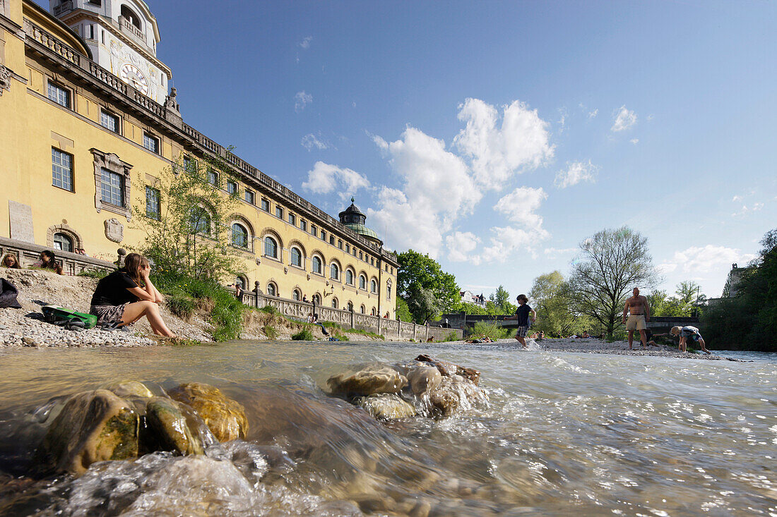 People relaxing at river Isar, Mullersches Volksbad, Munich, Bavaria, Germany