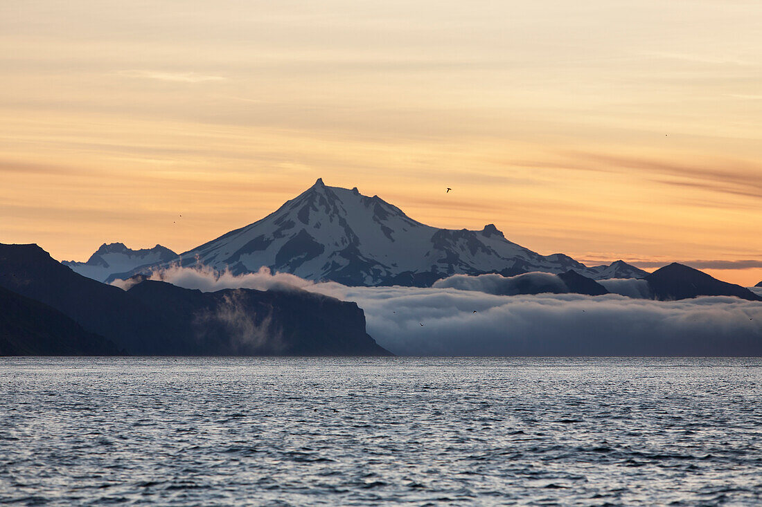 Frosty Peak on the Alaska Peninsula from Ikatan Bay near False Pass, Southwest Alaska, summer.