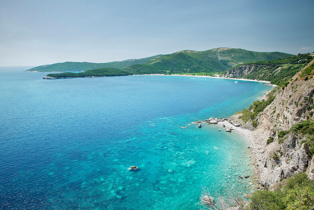 High angle view of turquoise blue water along the coastline at Budva, Adriatic coastline, Montenegro, Western Balkan, Europe