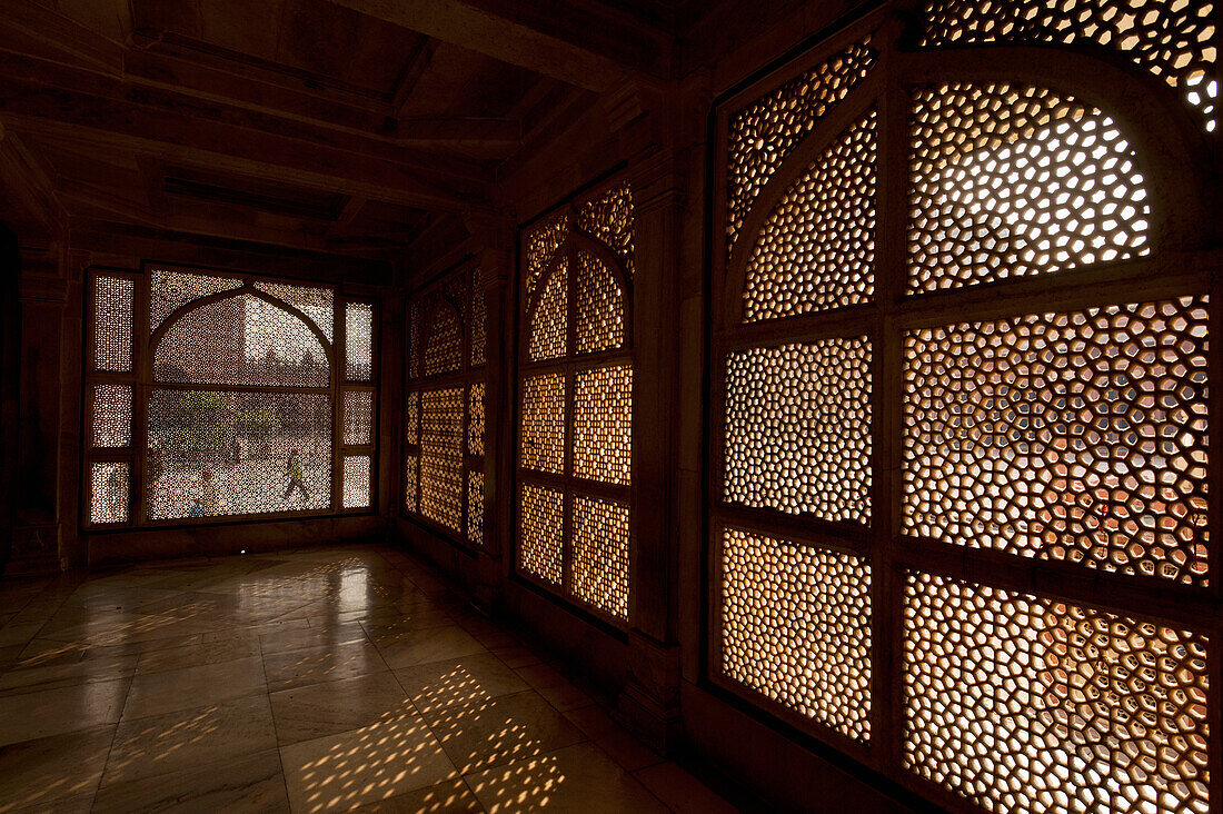 Looking through stone lattice grills in Jami Masjid, Fatehpur Sikri, Agra, India