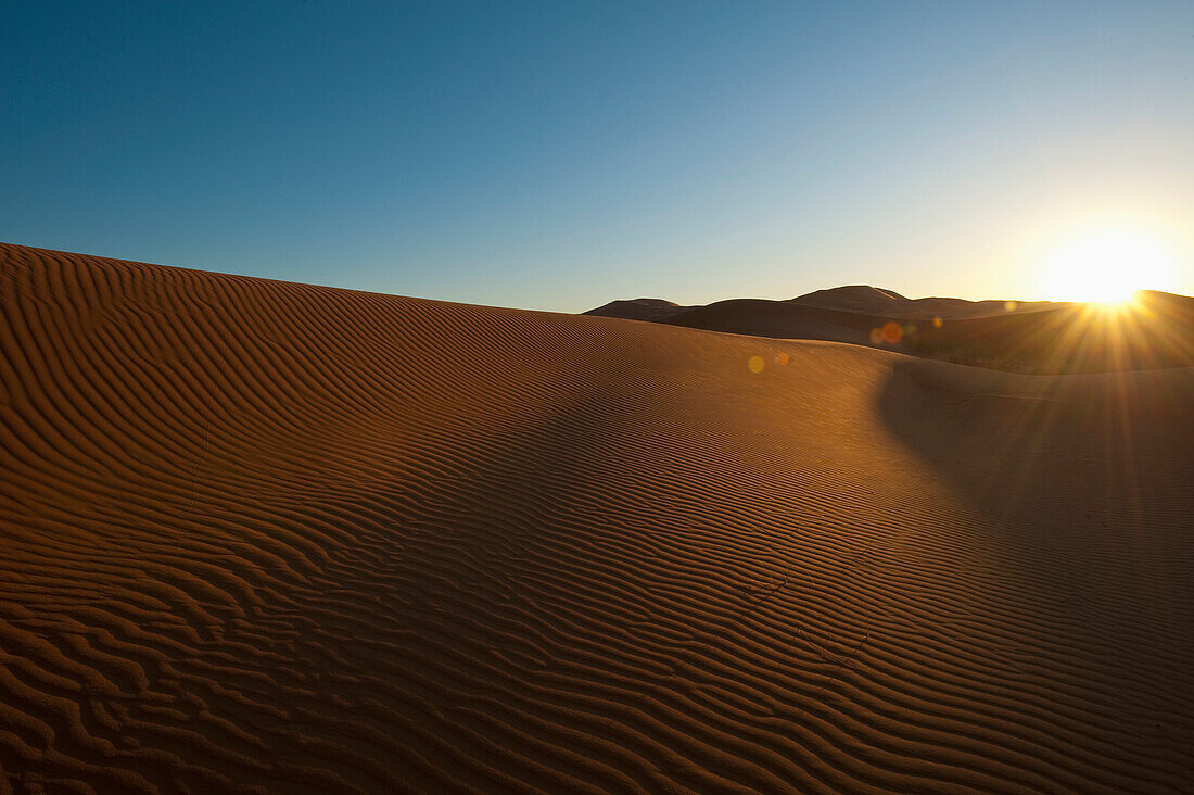 Sand dune at dawn near Merzouga in Sahara Desert, Erg Chebbi, Morocco
