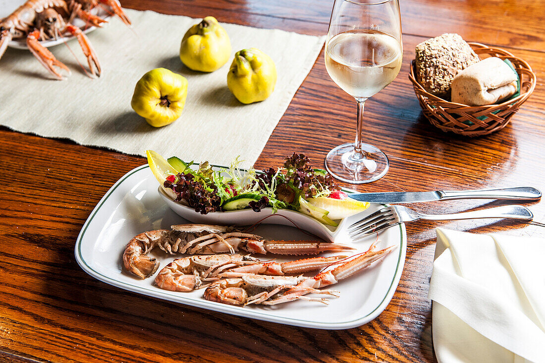 Langostinos with salad, Schaprode, island of Ruegen, Mecklenburg-Western Pomerania, Germany