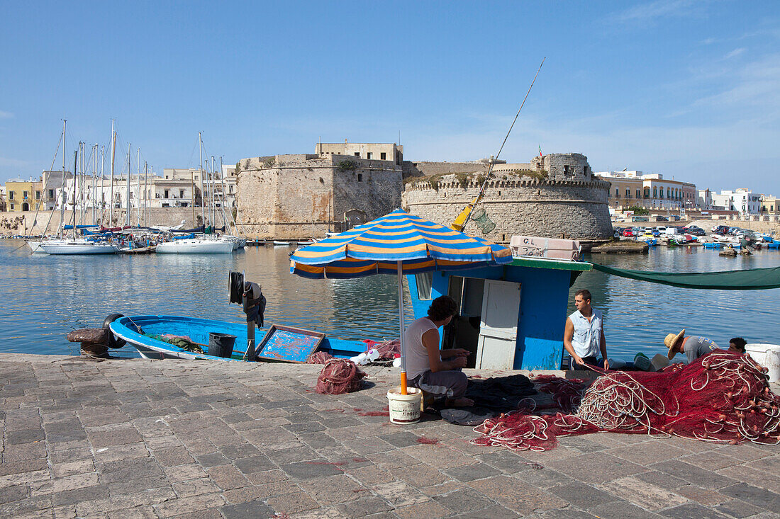 Fishing boats in the harbour of Gallipoli, Lecce Province, Apulia, Gulf of Taranto, Italy, Europe