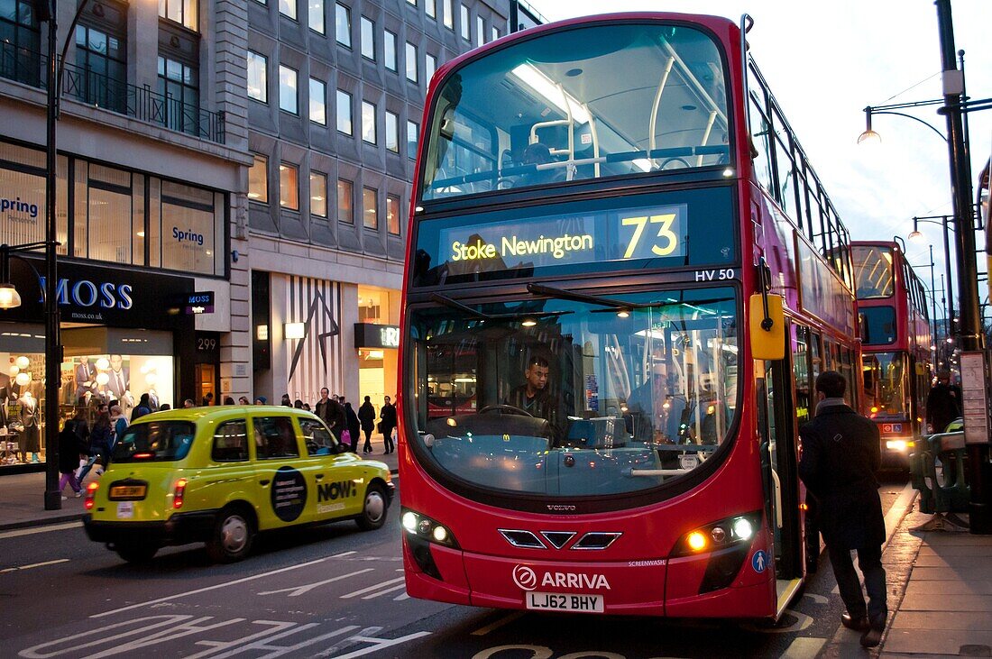 Traffic on Oxford Street at dusk, London UK