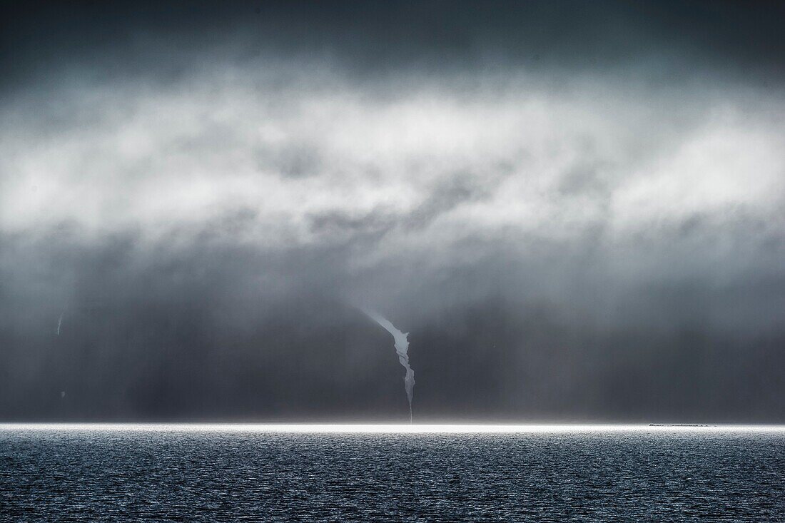 Clouds and Sun rays over the Greenland sea, Svalbard, Norway.