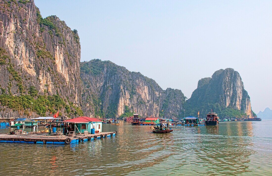 Old Boats and junkets Halong Bay Ha Long at ragged peaks and fishing villages mountains relax Vietnam