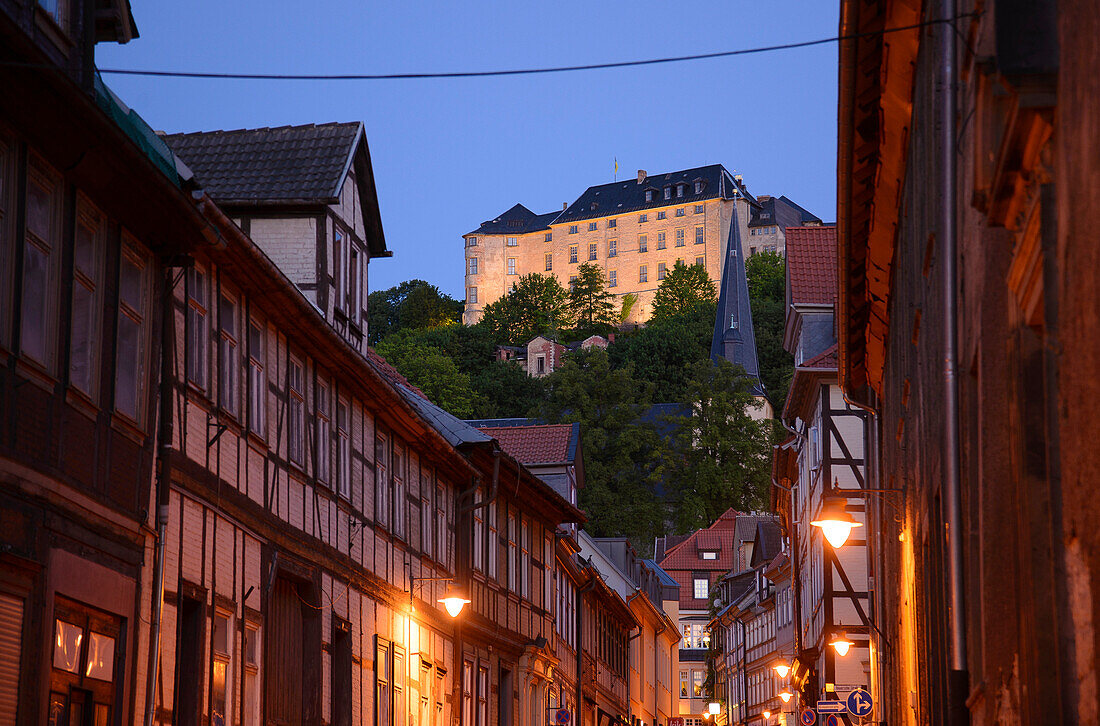 Alley with timbered houses and view to castle, Blankenburg, Harz, Saxony-Anhalt, Germany, Europe