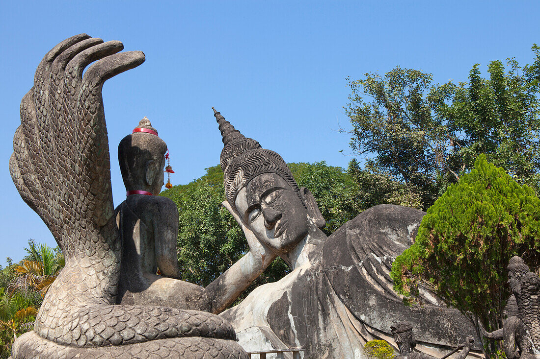 Buddhistic sculptures in Xieng Khuan Buddha Park in Vientiane, capital of Laos, Asia