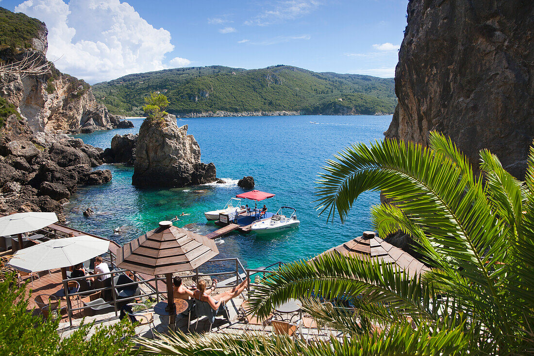 Excursion boats at La Grotta Bay, near Paleokastritsa, Corfu island, Ionian islands, Greece