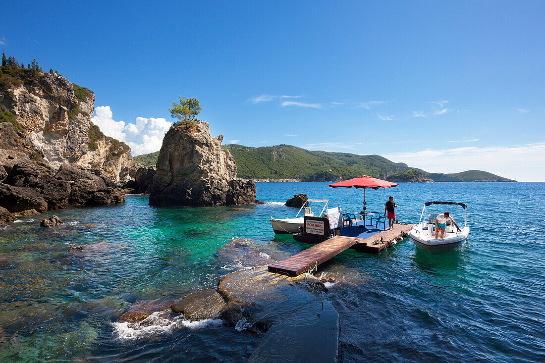 Excursion boats at La Grotta Bay, near Paleokastritsa, Corfu island, Ionian islands, Greece