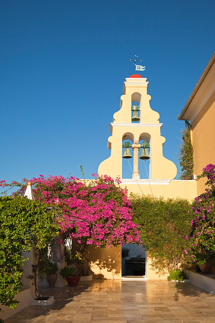 Courtyard and bell tower of Panagia Theotokou monastery, near Paleokastritsa, Corfu island, Ionian islands, Greece