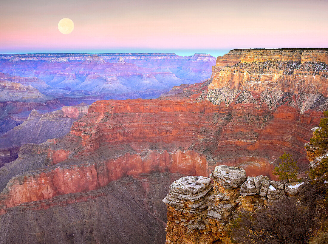 Full moon over the Grand Canyon at sunset as seen from Pima Point, Grand Canyon National Park, Arizona