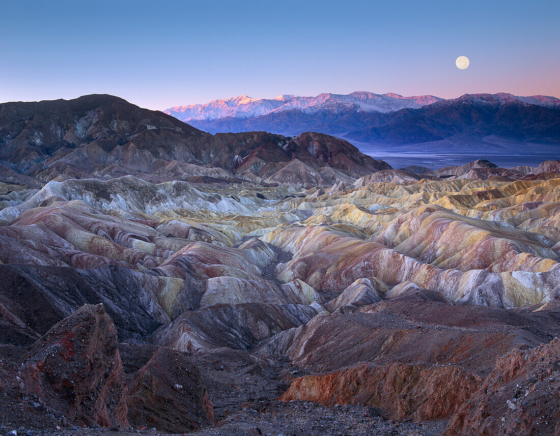 Full moon rising over Zabriskie Point, Death Valley National Park, California