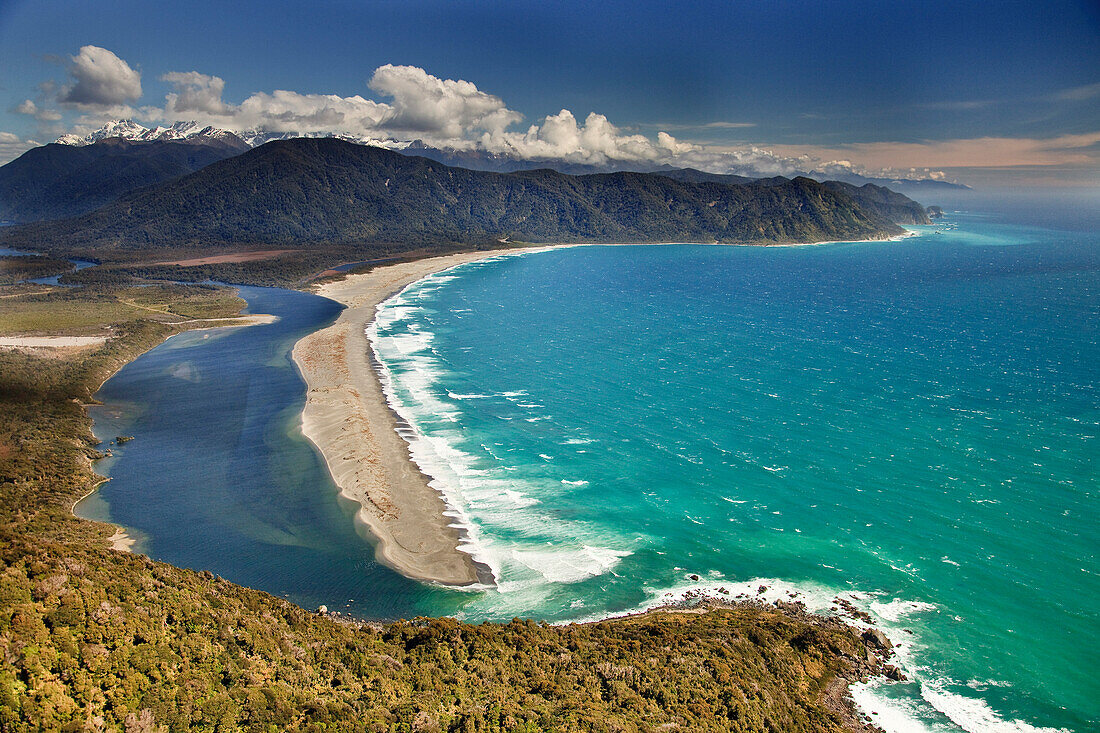 Martin's Bay with Mount Tutoko and Darran Mountains behind and sand dune spit, Fiordland National Park, New Zealand