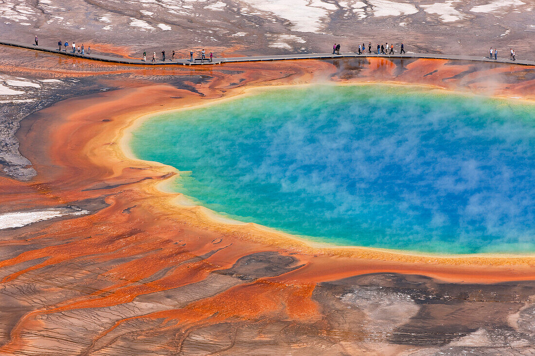 Tourists viewing Grand Prismatic Pool, Midway Geyser Basin, Yellowstone National Park, Wyoming