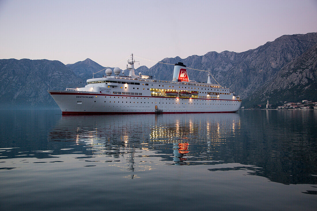 Cruise ship MS Deutschland, Reederei Peter Deilmann, in Kotor Fjord at dusk, Kotor, Montenegro