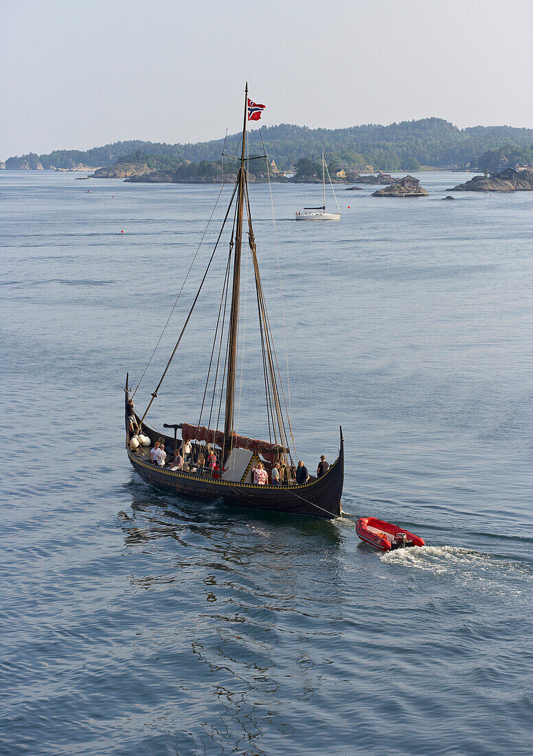 View from ferry Stroemstad, Sweden, to Sandefjord, Norway, with sailing boat and skerries near Sandefjord, Norway, Europe